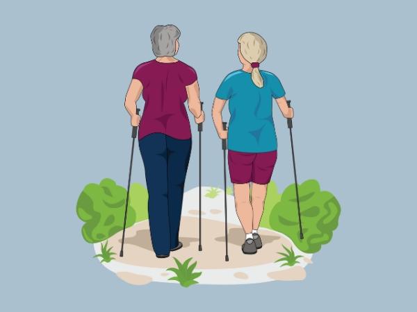 Zwei Frauen sind von hinten beim Walken zu sehen.